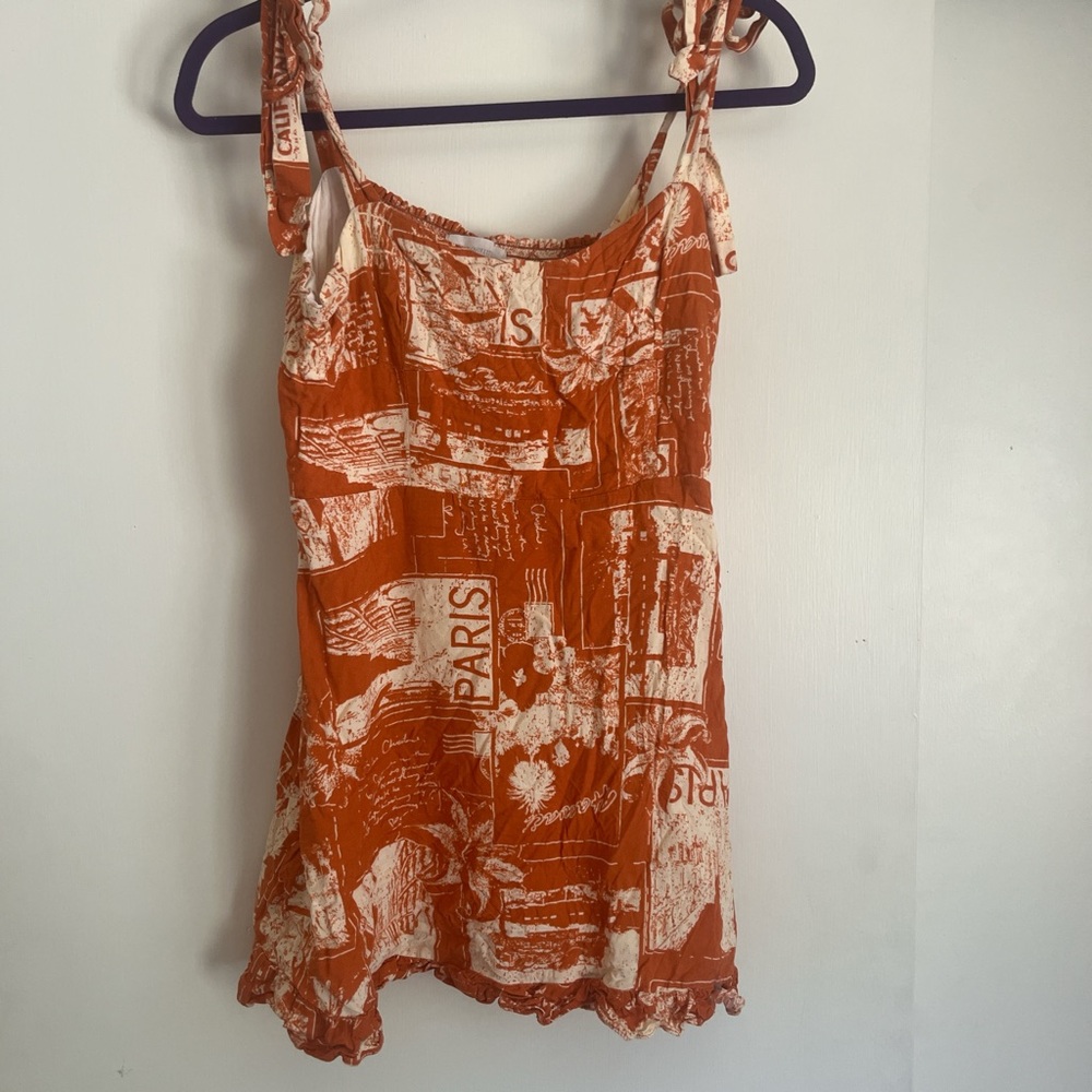 Orange and white Paris print urban dress with tie straps.